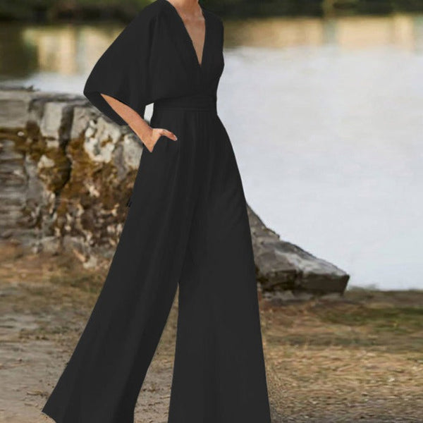 SOPHIA - Elegant jumpsuit med V-ringning, halvärmar och vida ben